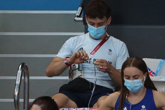 <p>Tom Daley knitting at the Olympics</p>