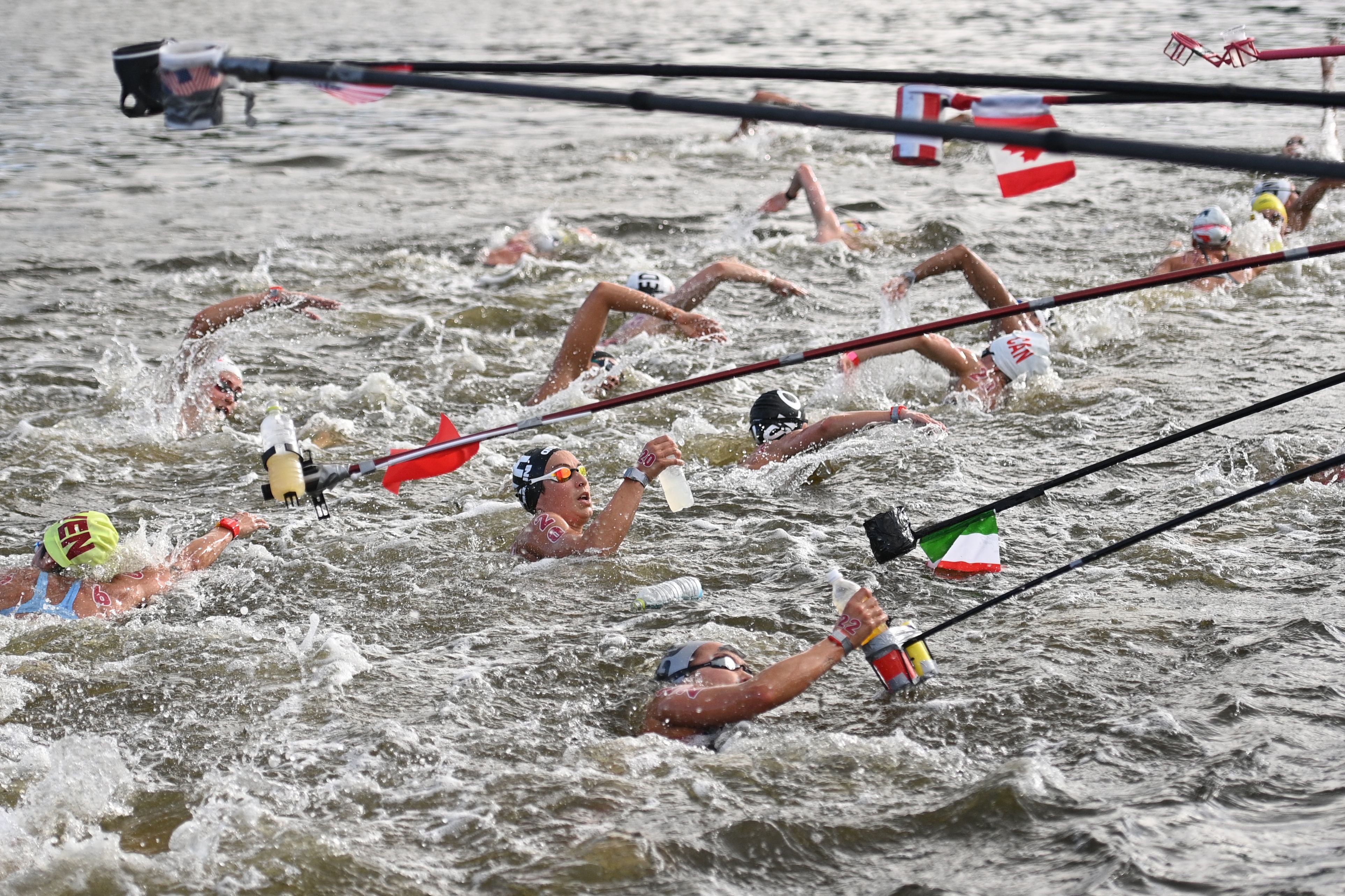 Olympic viewers amazed at how marathon swimmers get drinks during race | The Independent