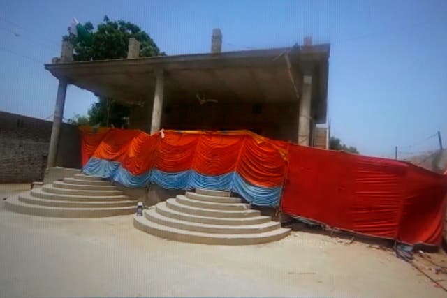 <p>This frame grab image from video, shows a Hindu temple cordoned off by local authorities after it was stormed by a Muslim mob, in Bhong, in Rahim Yar Khan district, Pakistan, Thursday, 5 August 2021. Pakistan on Thursday deployed paramilitary troops to avoid any communal violence after a Muslim mob badly damaged a Hindu temple</p>