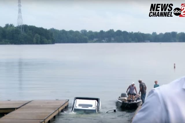 <p>Reporter Jakob Emerson soon disappeared behind the camera to capture the sinking of the pickup truck at Lake Springfield in Illinois</p>