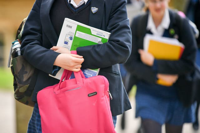 Parents face spending more than £4,000 on technology and similar sums on pocket money, packed lunches and uniforms by the time their children reach the age of 16, according to MoneySuperMarket (Ben Birchall/PA)