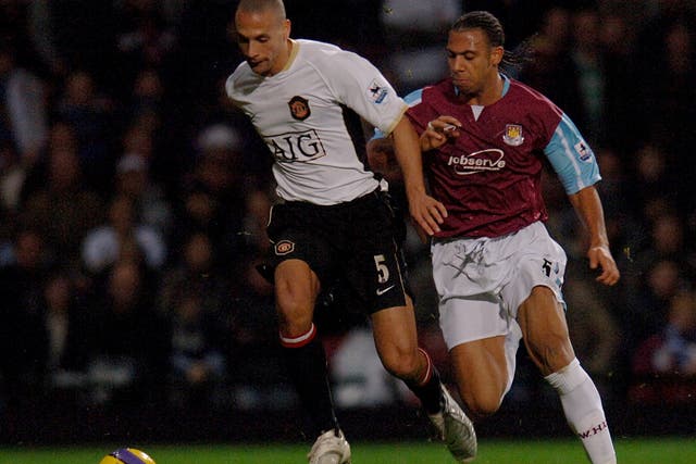 Rio Ferdinand, left, and brother Anton are backing a bid to buy West Ham (Sean Dempsey/PA)