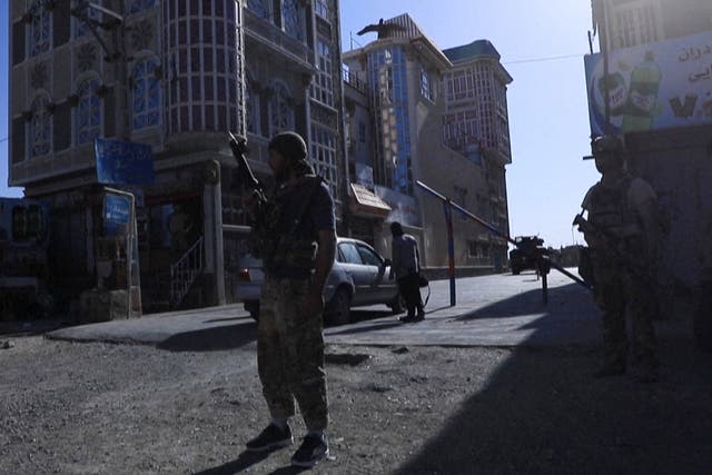 <p>File: Afghan special forces patrol the streets of Herat as the Taliban continue a series of offensives against urban areas in Afghanistan </p>