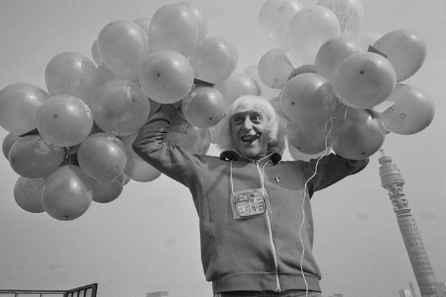 <p>Jimmy Savile on the roof of Broadcasting House in London to celebrate the fifth anniversary of BBC radio, 30 September 1972</p>