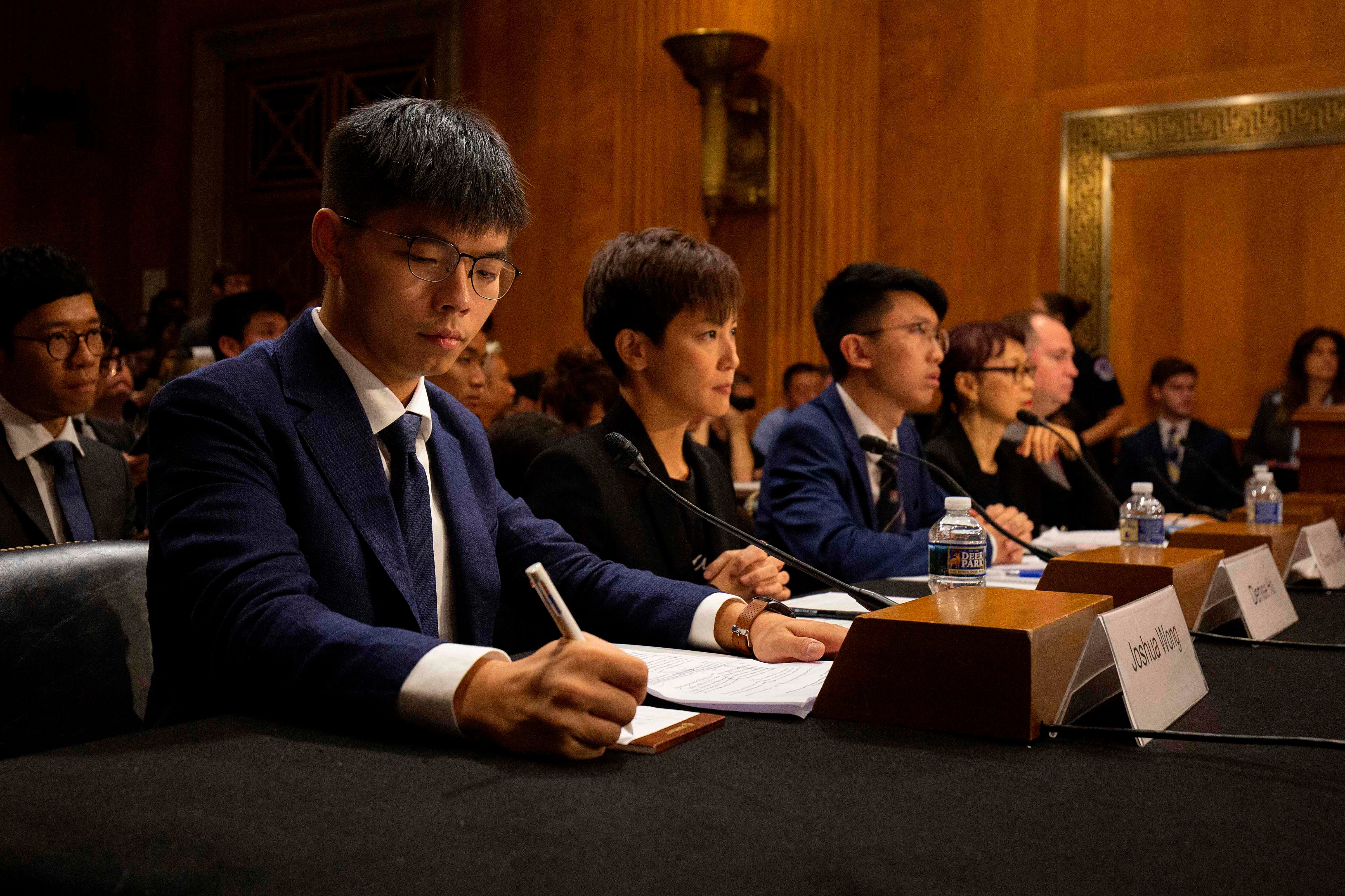 Hong Kong pro-democracy activists at a Congress office on Capitol Hill