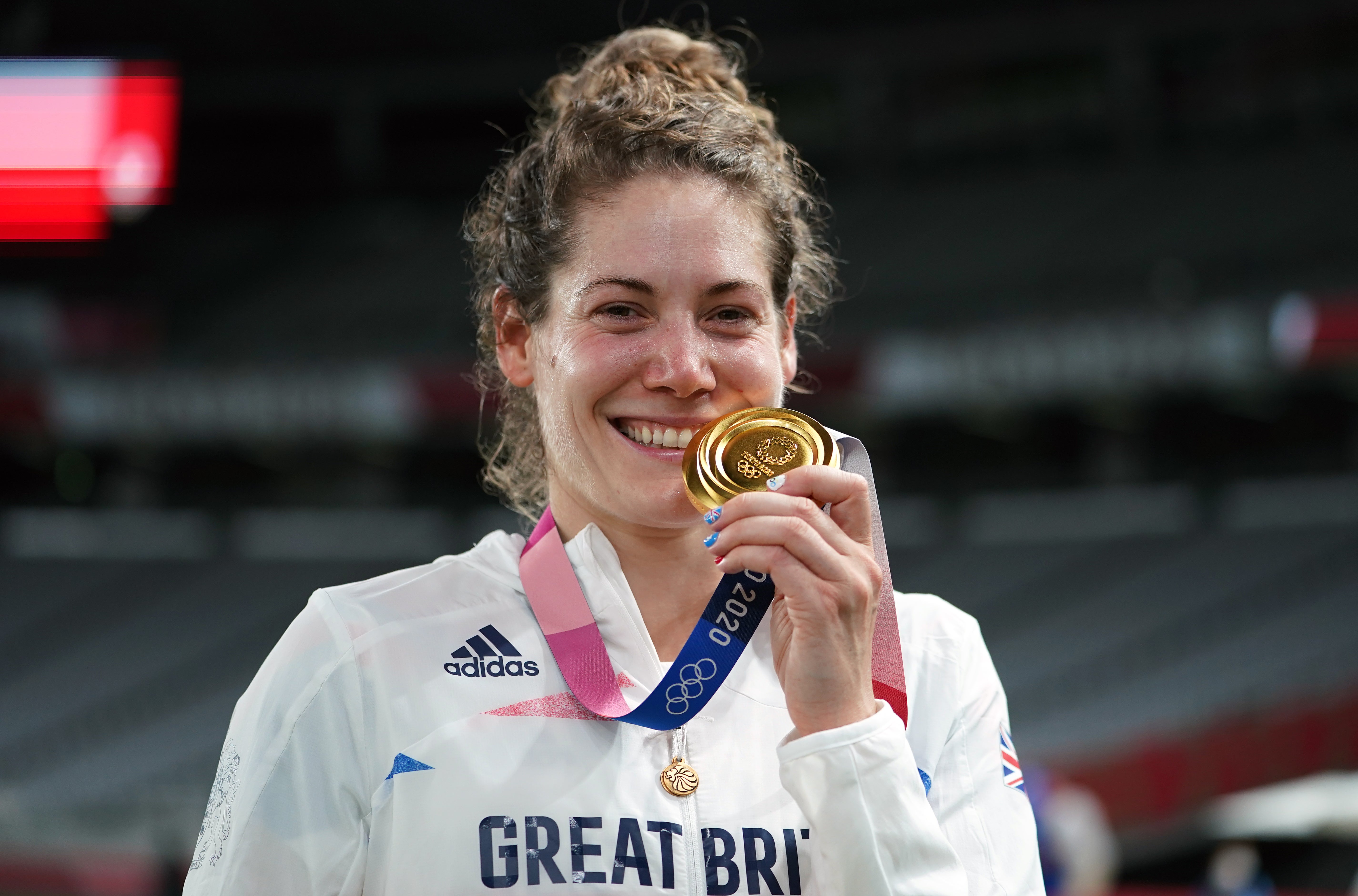 Kate French celebrates with her modern pentathlon gold