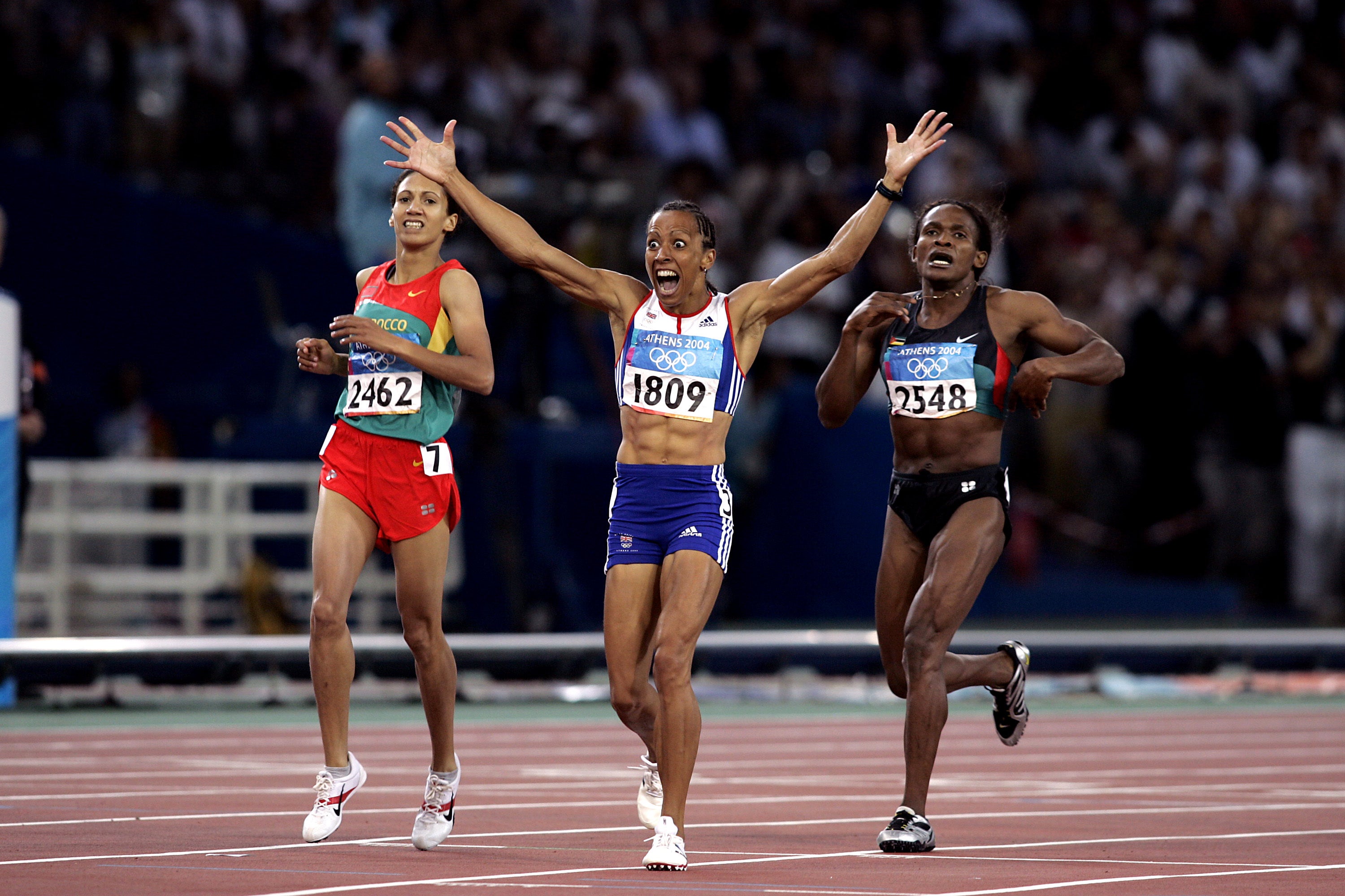 Dame Kelly Holmes celebrates winning 800m gold in 2004 (Phil Noble/PA)