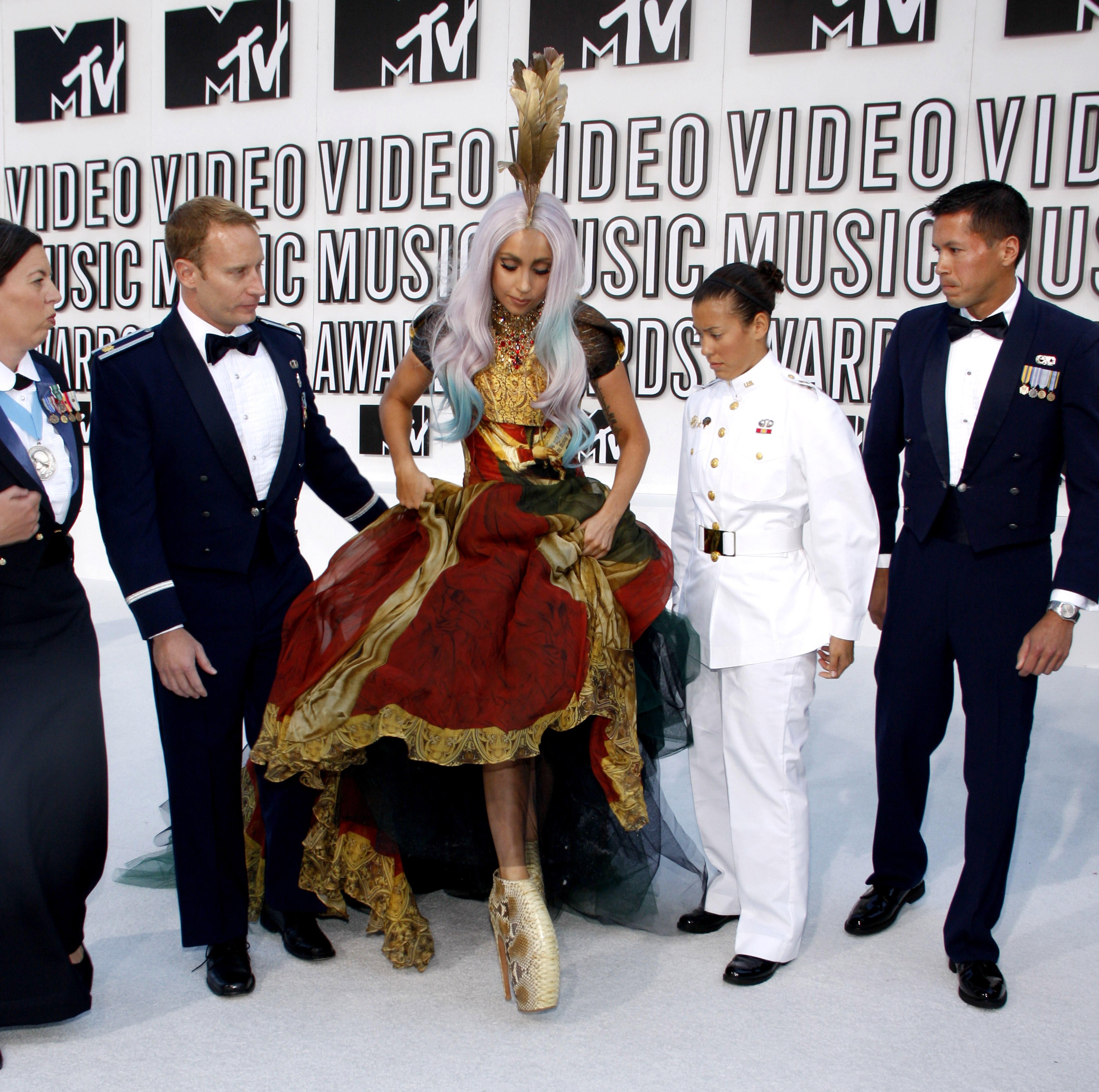 Lady Gaga wearing Alexander McQueen’s armadillo boots to the 2010 MTV VMAs (Alamy/PA)