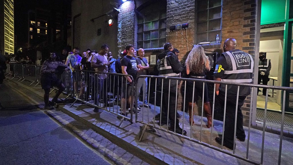 People queue up for the Egg nightclub in London, after the final legal coronavirus restrictions were lifted in England at 12.01am on 19 July