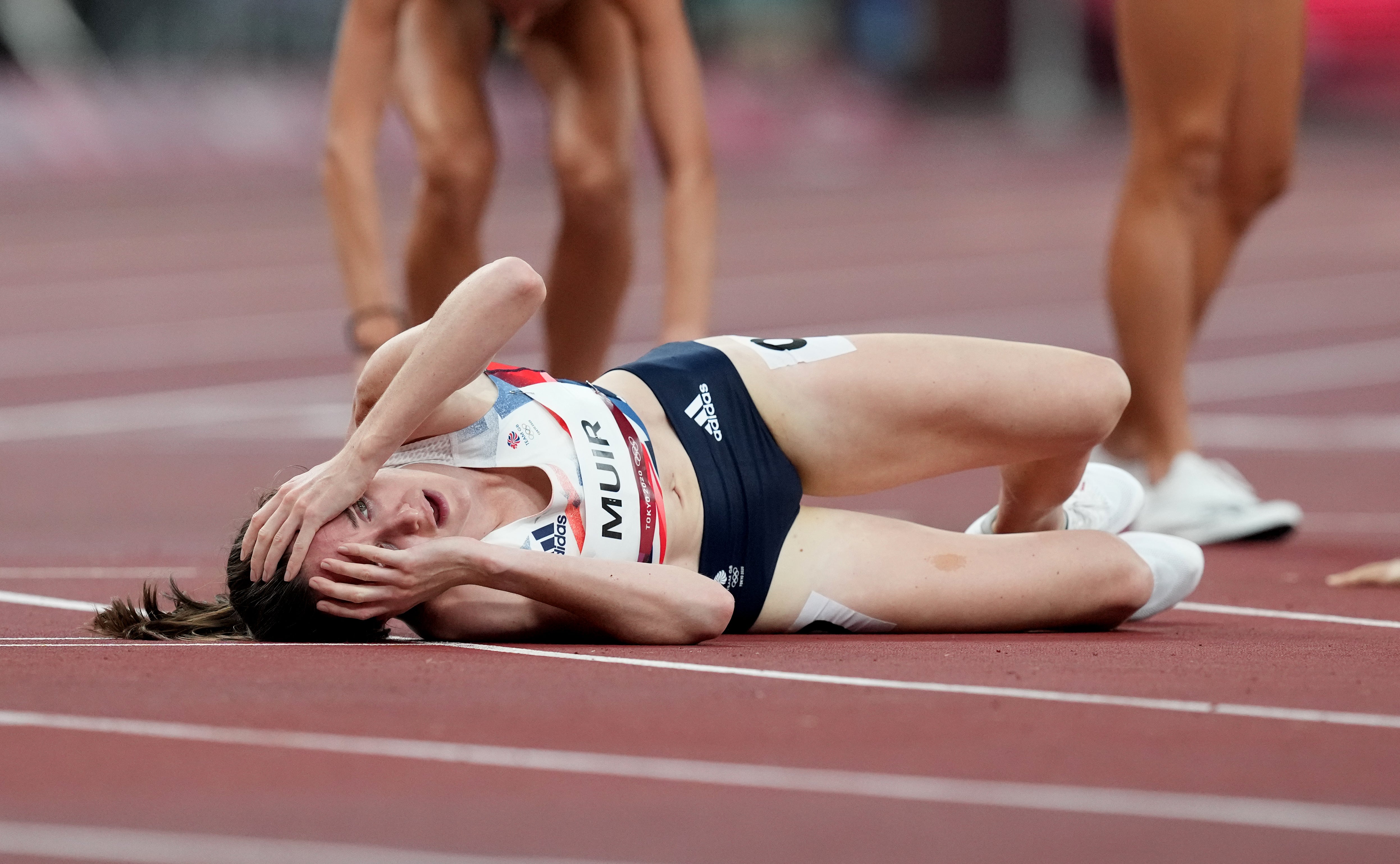 Great Britain’s Laura Muir reacts after crossing the line to win silver (Martin Rickett/PA)