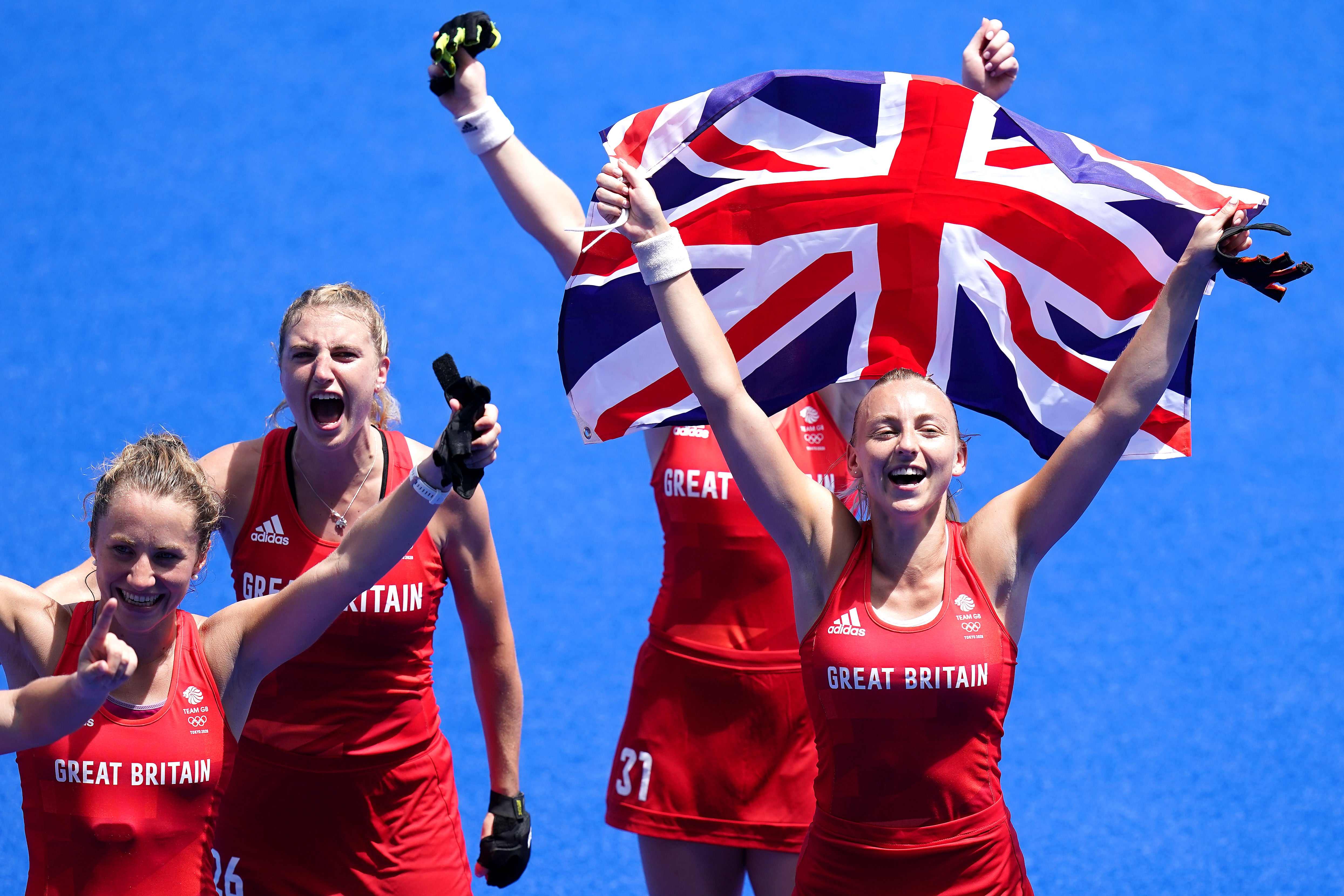 Great Britain’s Lily Owsley, Grace Balsdon and Hannah Martin celebrate winning bronze (Adam Davy/PA)