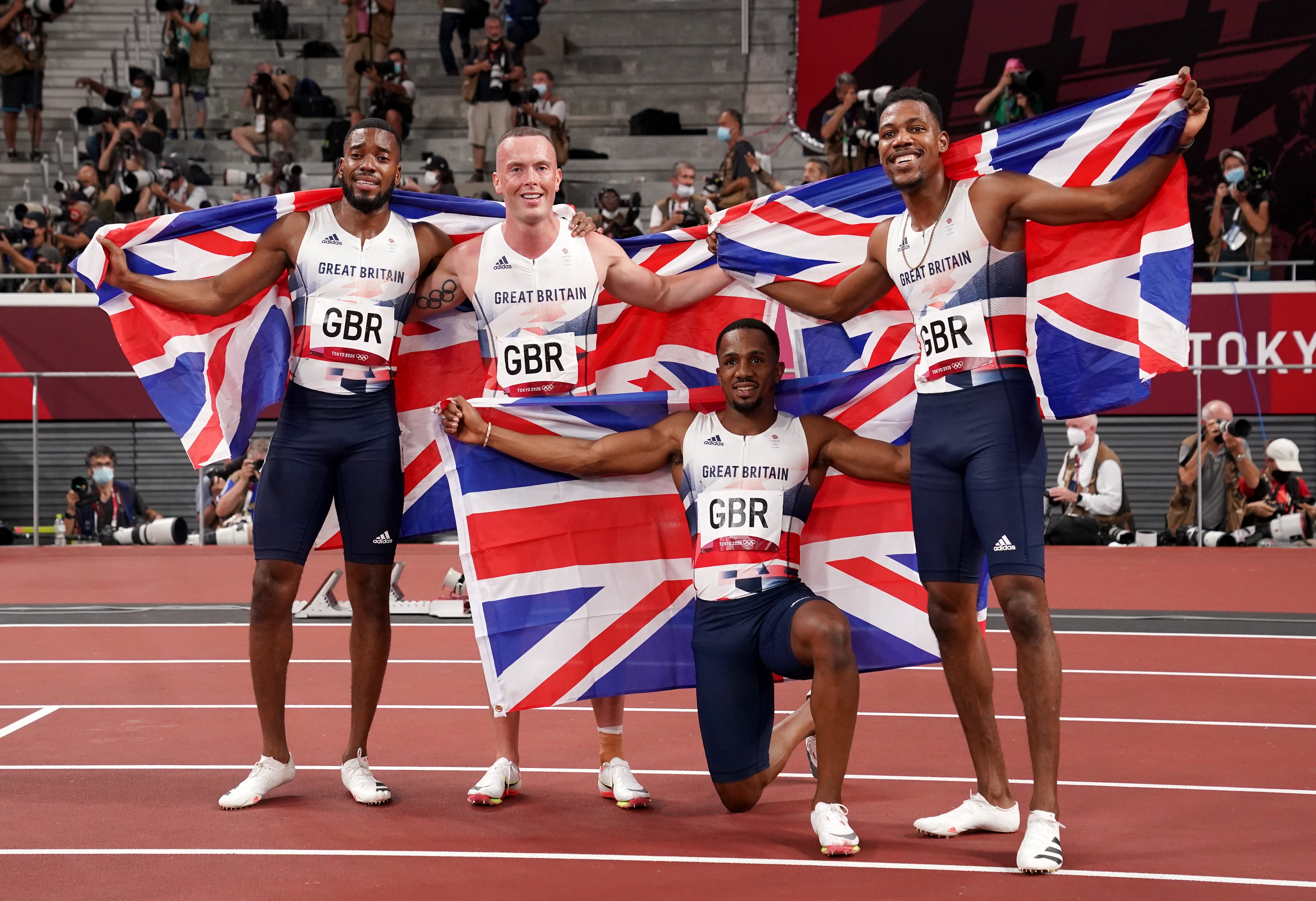 Left to right, Great Britain’s Nethaneel Mitchell-Blake, Richard Kilty, CJ Ujah and Zharnel Hughes after winning silver in the men’s 4 x 100m relay.