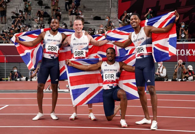 <p>CJ Ujah (second right) after winning silver in the men’s 4x100m relay</p>