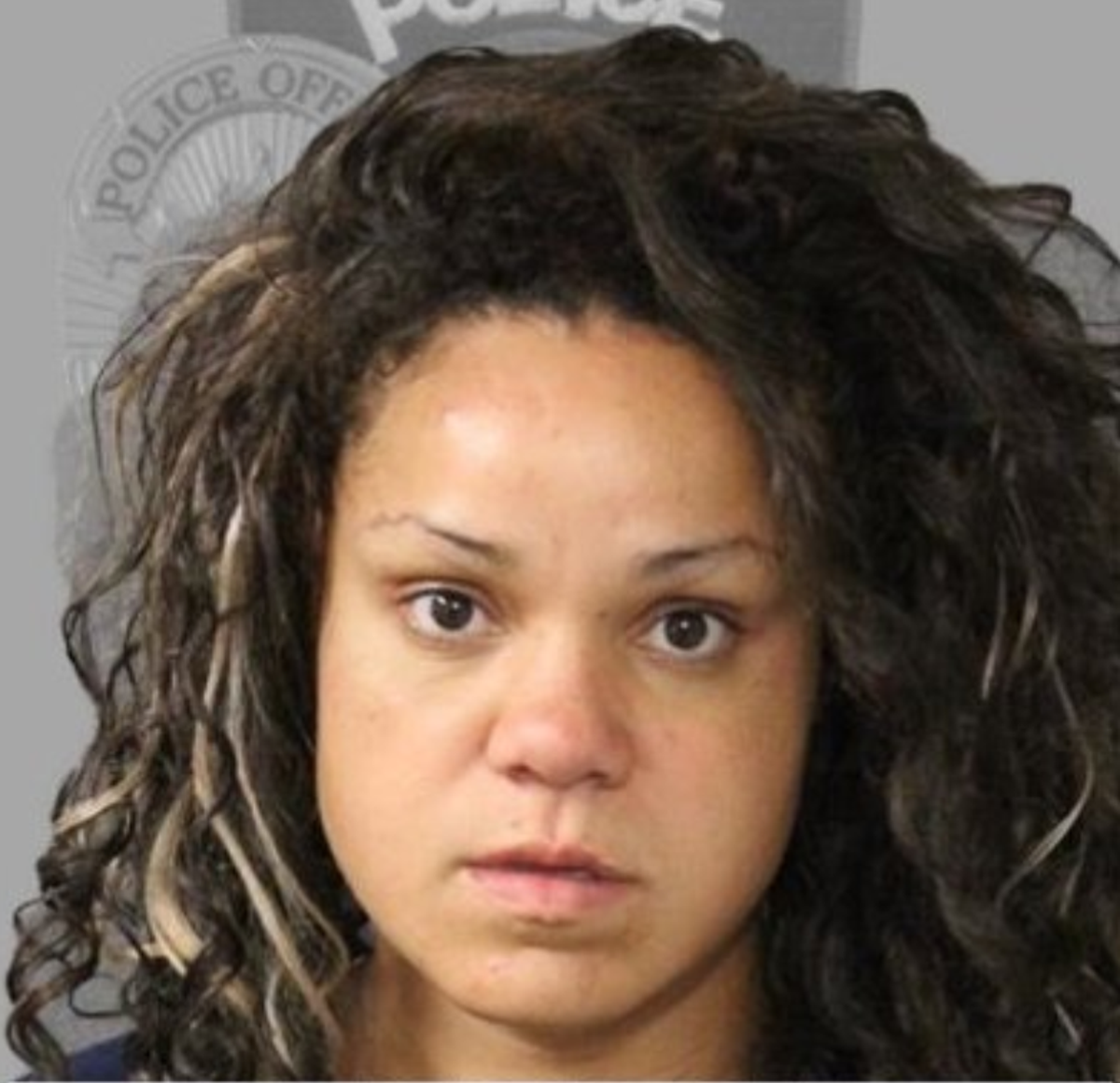 Woman arrested after being filmed forcing five-year-old son into trunk of car