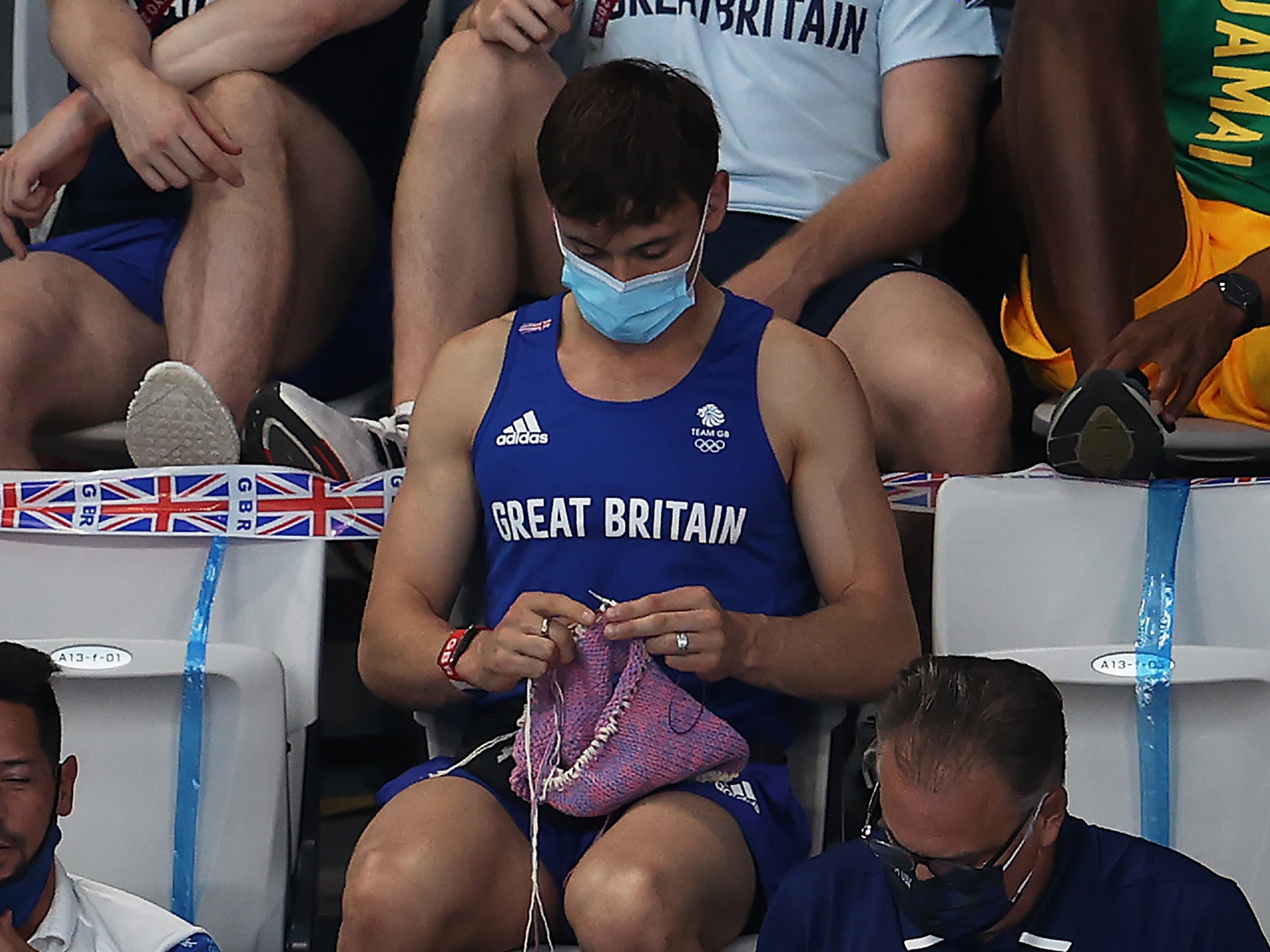 Needle time: Tom Daley knits from the sidelines at the Tokyo Games