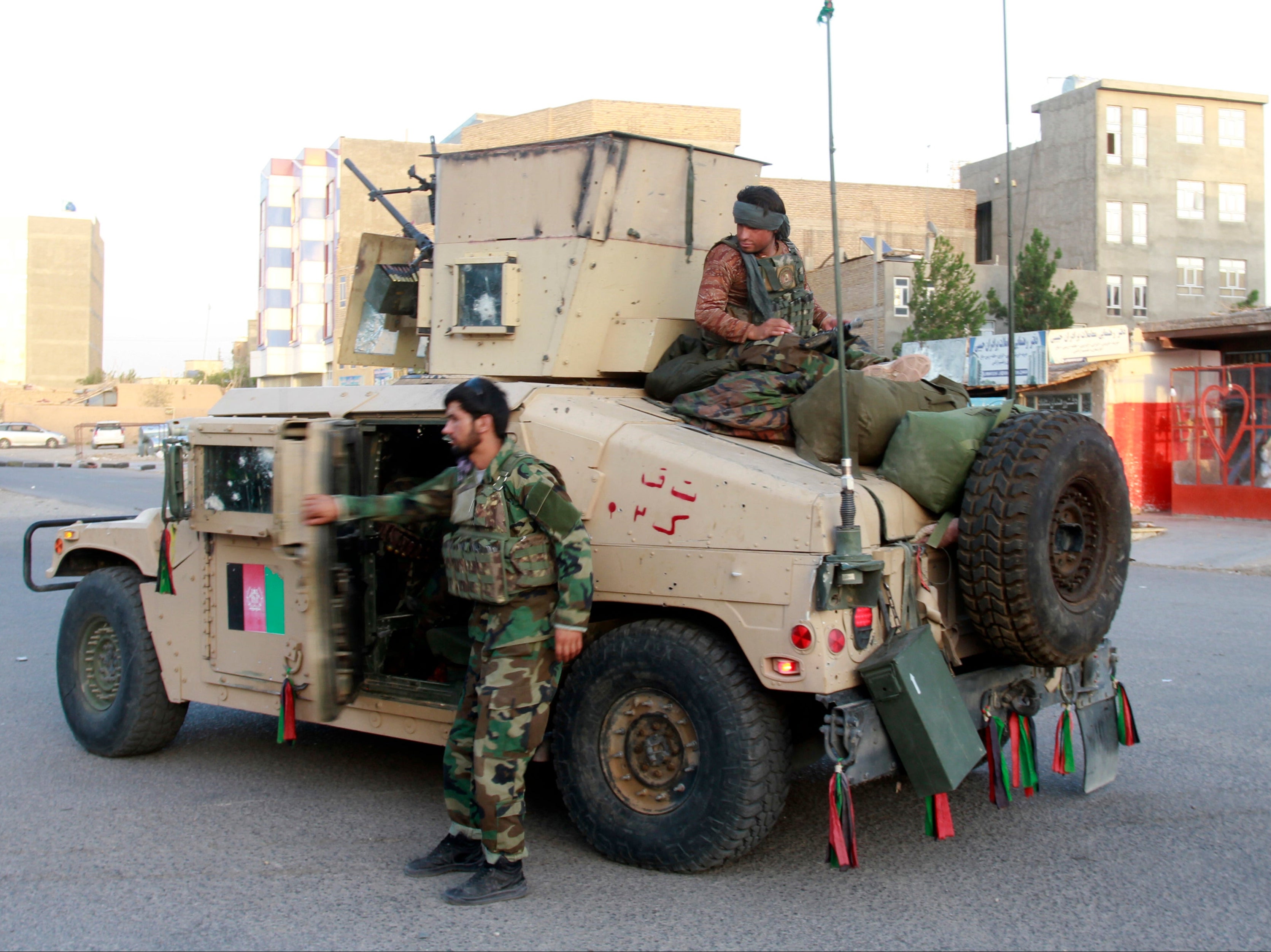<p>Afghan security personnel patrol in Herat</p>