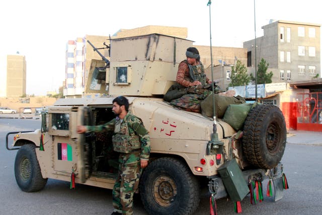 <p>Afghan security personnel patrol in Herat</p>