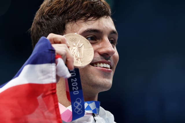 <p>Bronze medalist Thomas Daley of Team Great Britain poses after the medal ceremony</p>