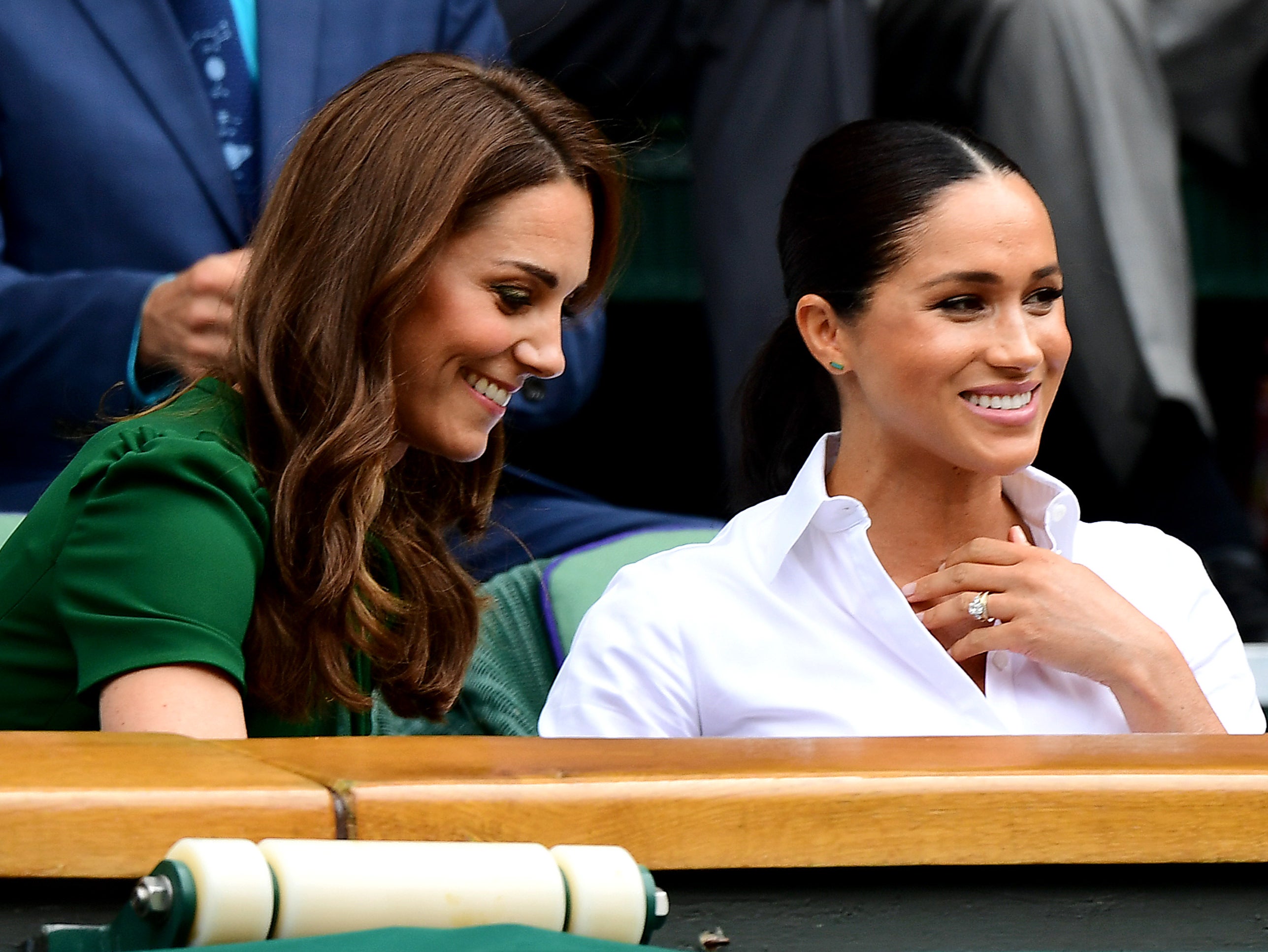 (L) Kate Middleton and Meghan Markle