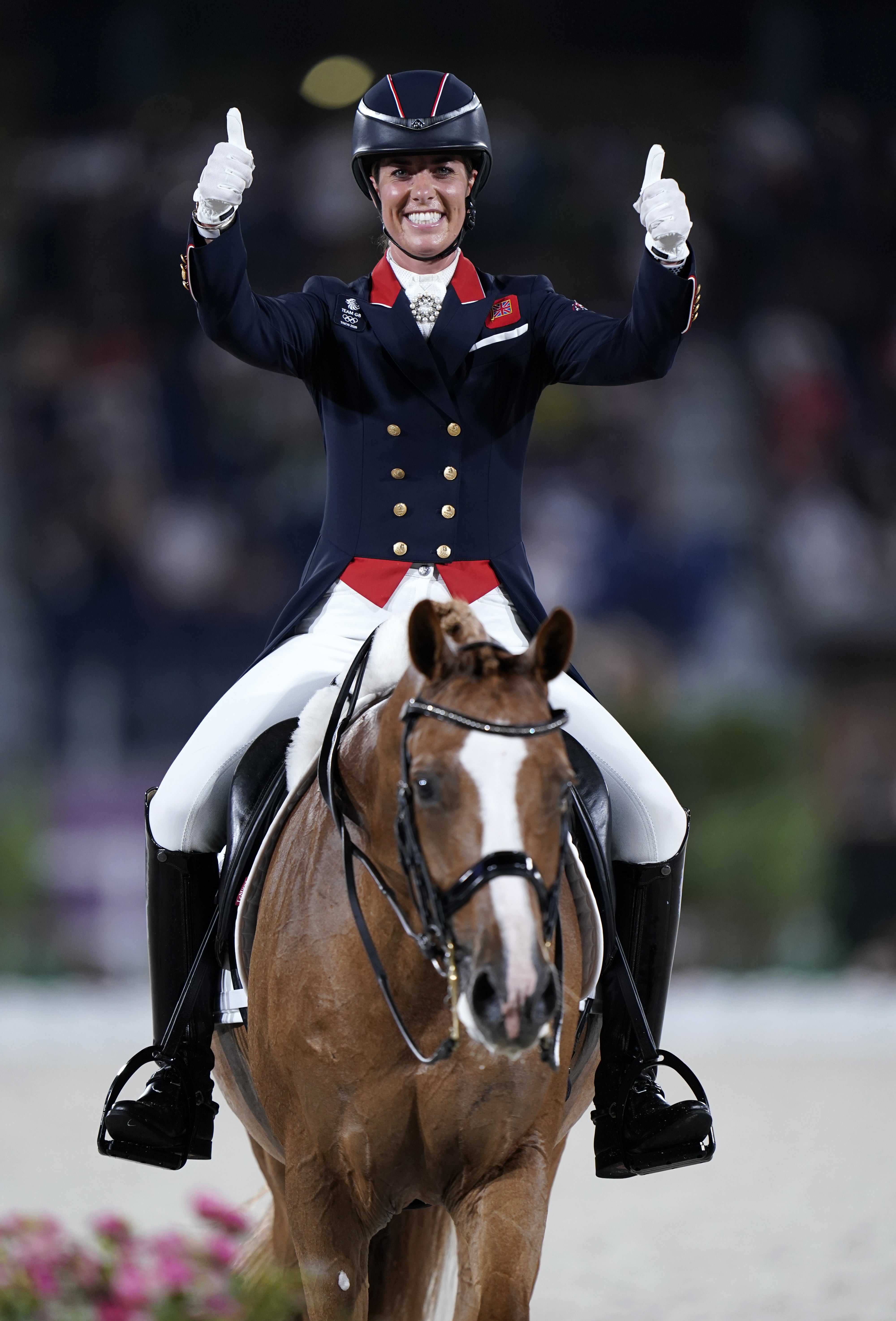 Charlotte Dujardin celebrates winning bronze in the Grand Prix Freestyle – Individual Final, on Gio, to become Great Britain’s most decorated female Olympian with six medals (Danny Lawson/PA)