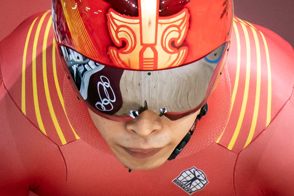 The Olympic rings are reflected in the helmet of China’s Chao Xu during the track cycling at the Izu Velodrome on the 12th day (Danny Lawson/PA)