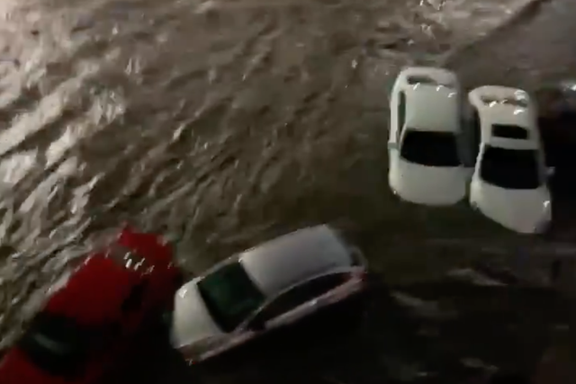 <p>Flash flooding partially submerged cars in downtown Omaha on Saturday night</p>