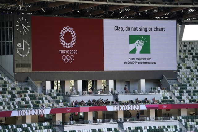 Covid-19 related warnings on the big screen ahead of the opening ceremony (Mike Egerton/PA)