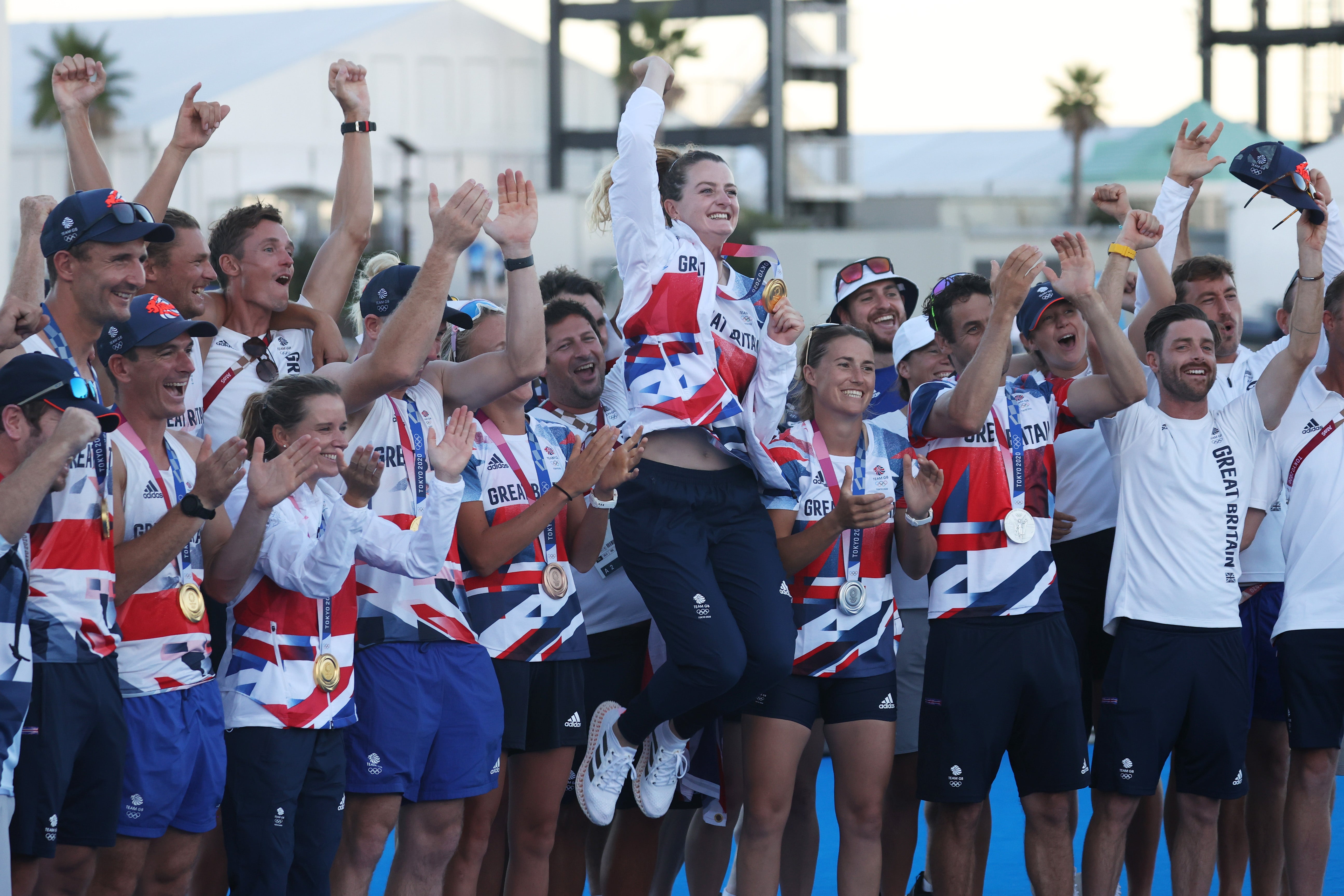 Women's 470 gold medalist Eilidh McIntyre (centre) of Team Great Britain pose with other Team GB medalists