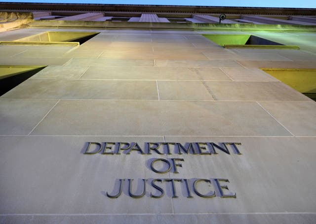 <p>A Trump administration website says the Department of Justice building is ‘not core to government operations’</p>