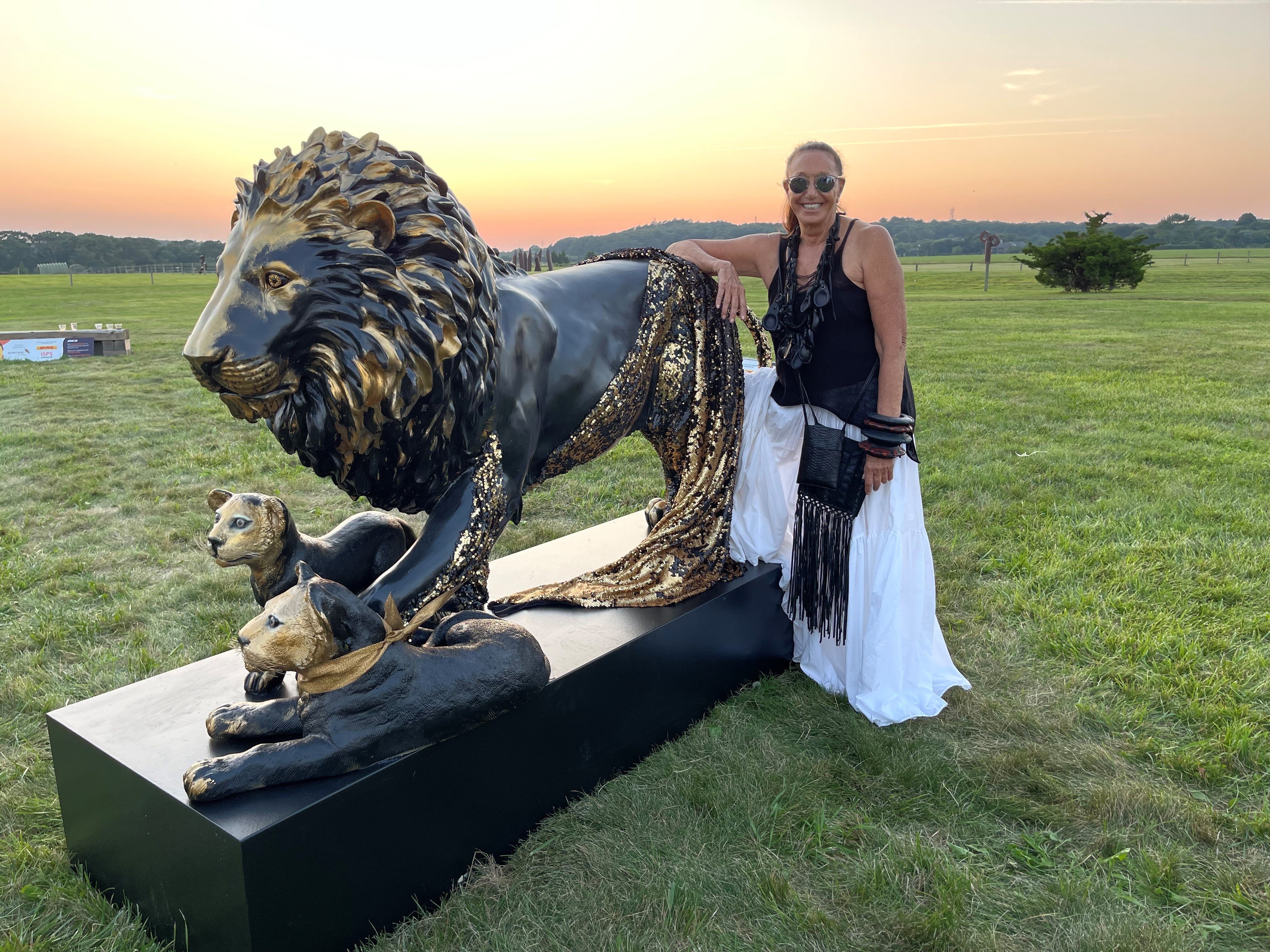 Fashion designer Donna Karan with her lion in The Hamptons (Tusk/PA)