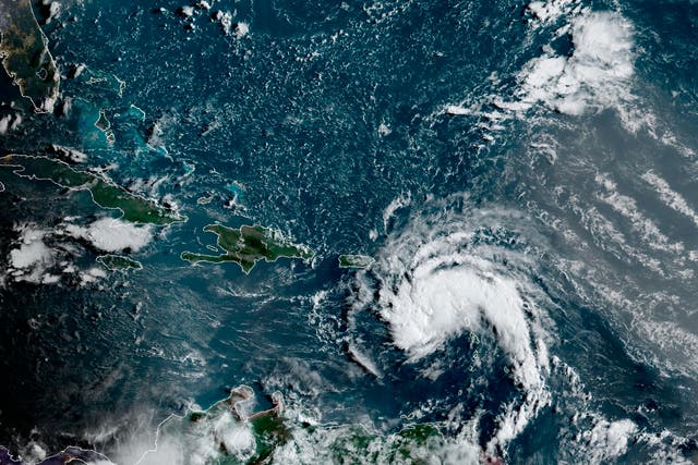 <p>Satellite image provided by the National Oceanic and Atmospheric Administration (NOAA) shows a tropical storm east of Puerto Rico in the Caribbean, at 7:50am EST, Tuesday, 10 August 2021</p>