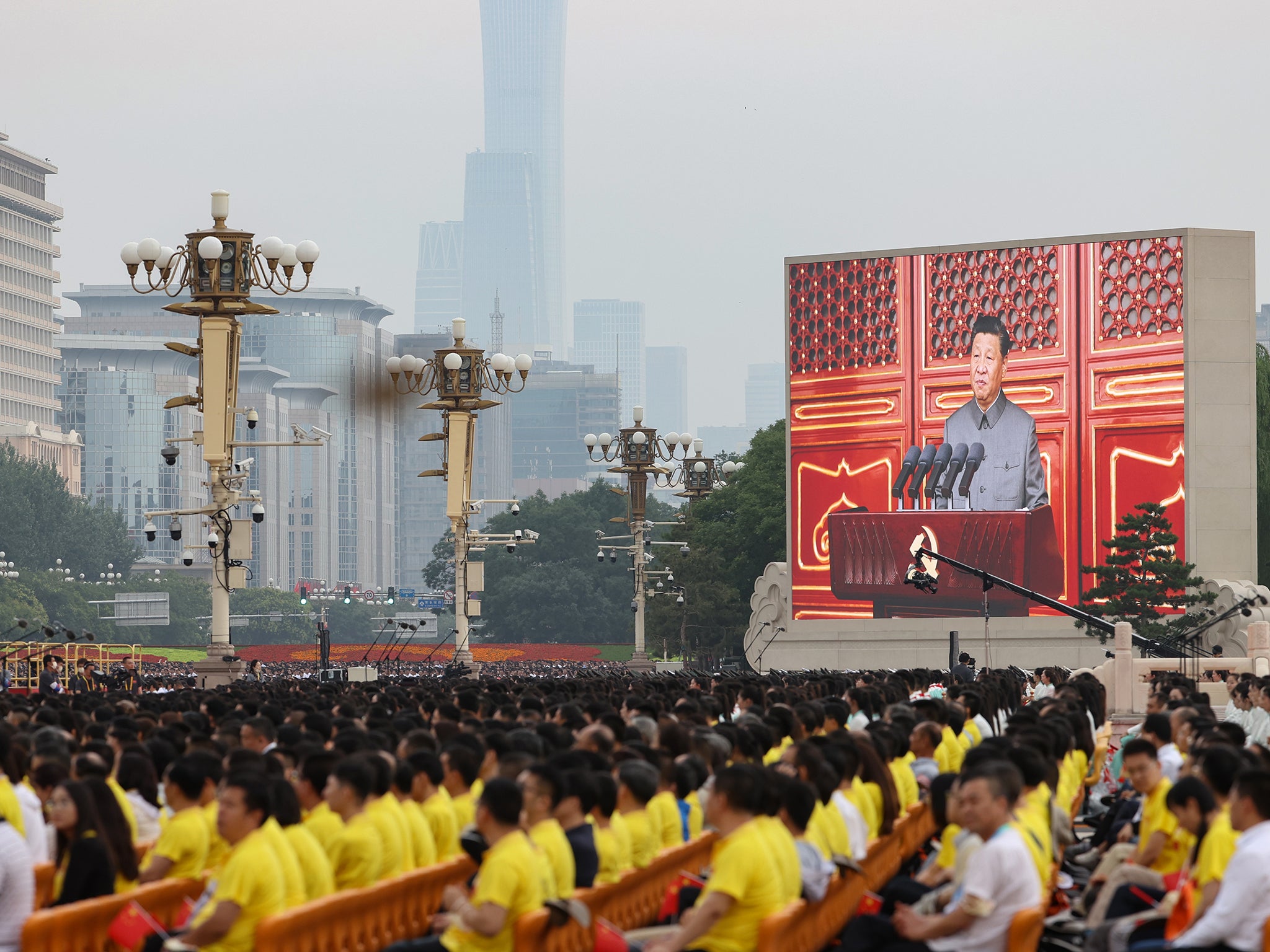 File: A large screen shows Chinese President Xi Jinping makes a speech during the celebration marking 100th anniversary of Chinese Communist Party at Tiananmen Square in Beijing.