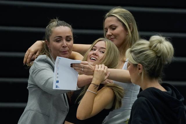<p>Students at Archbishop Blanch School in Liverpool receive their A-Level results</p>