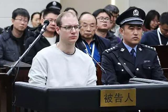 <p>This handout photograph taken and released by the Intermediate Peoples' Court of Dalian on January 14, 2019 shows Canadian Robert Lloyd Schellenberg (front L) during his retrial on drug trafficking charges in the court in Dalian in China's northeast Liaoning province.</p>