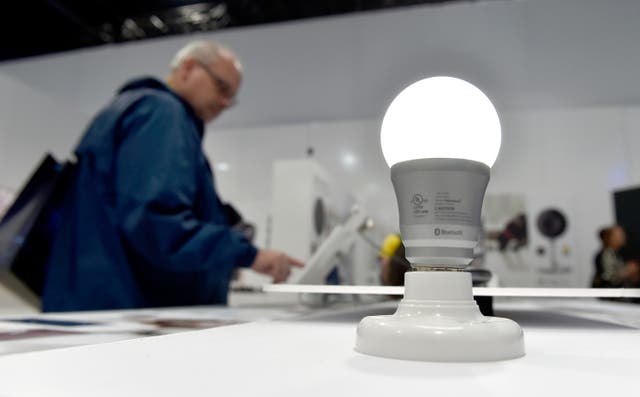 <p>A Rainbow7 Bluetooth smart-enabled lightbulb is illuminated at CES 2016 at the Las Vegas Convention Center on January 6, 2016 in Las Vegas, Nevada. The USD 29.99 multi-colored LED light bulb is currently available.</p>