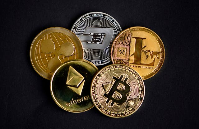 <p>Photo shows physical imitations of cryptocurrency in Dortmund, western Germany</p>