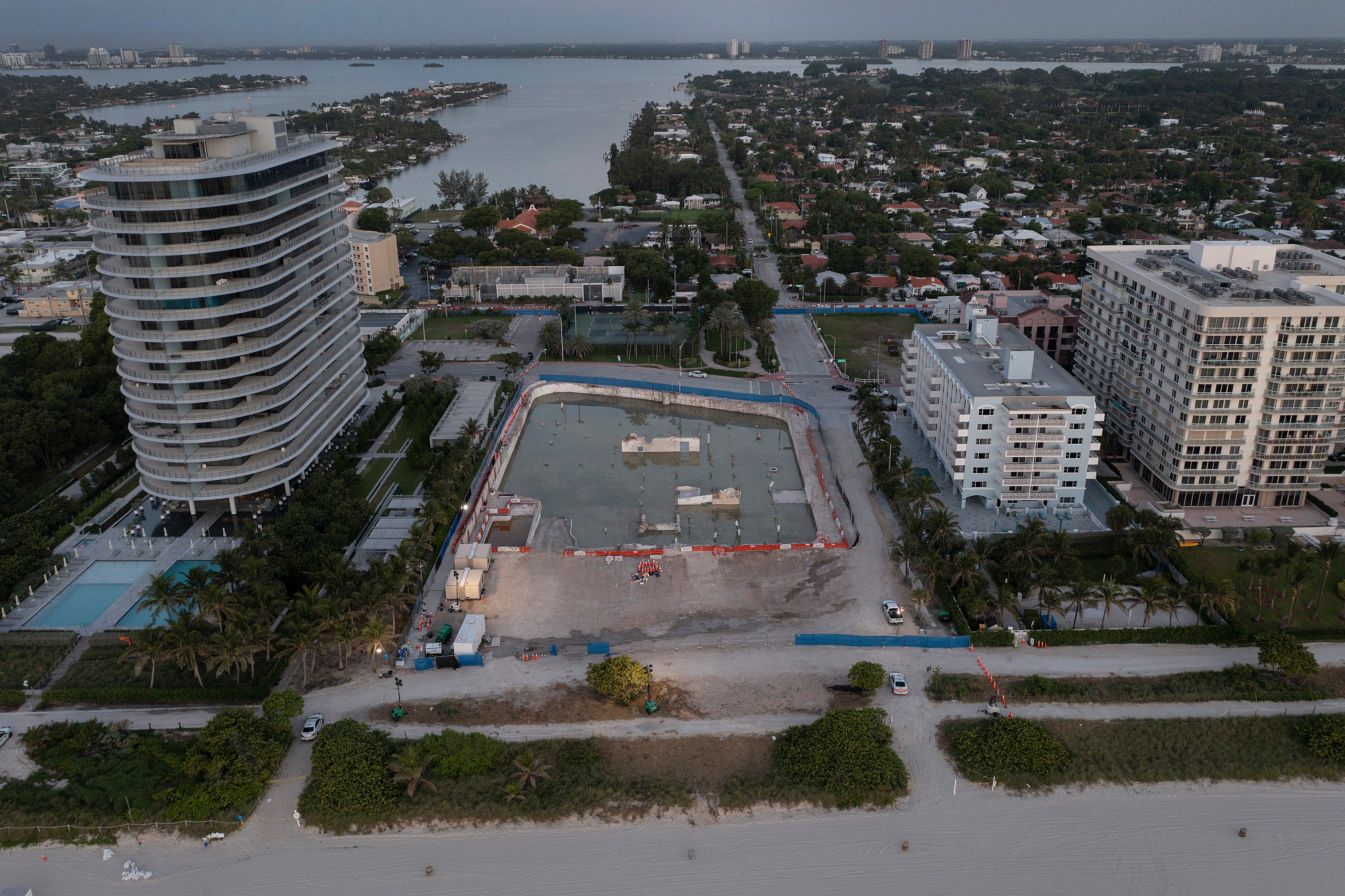 In this aerial view, the cleared lot that was where the collapsed 12-story Champlain Towers South condo building once stood on July 31, 2021 in Surfside, Florida.
