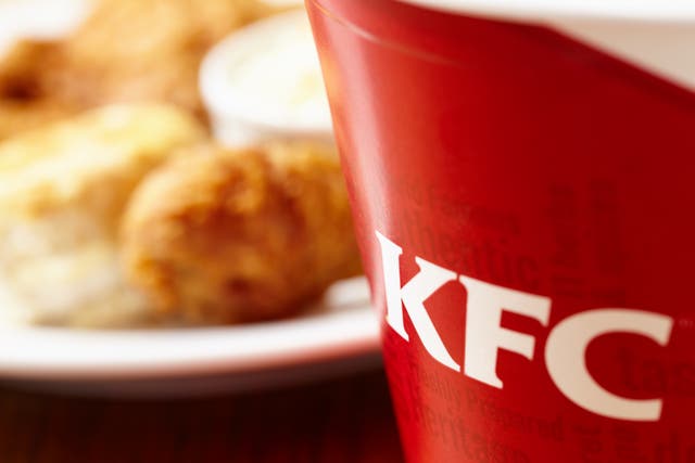 <p>A KFC bucket and fried chicken</p>