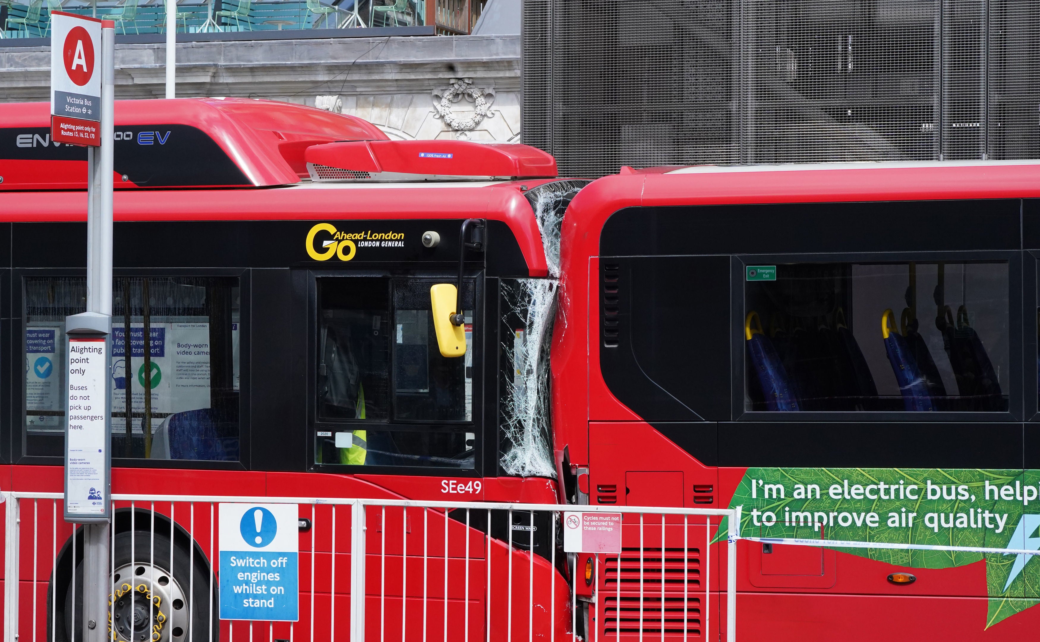 The scene at Victoria bus station, central London, after a crash involving two buses in which a female pedestrian was killed and two other people were injured