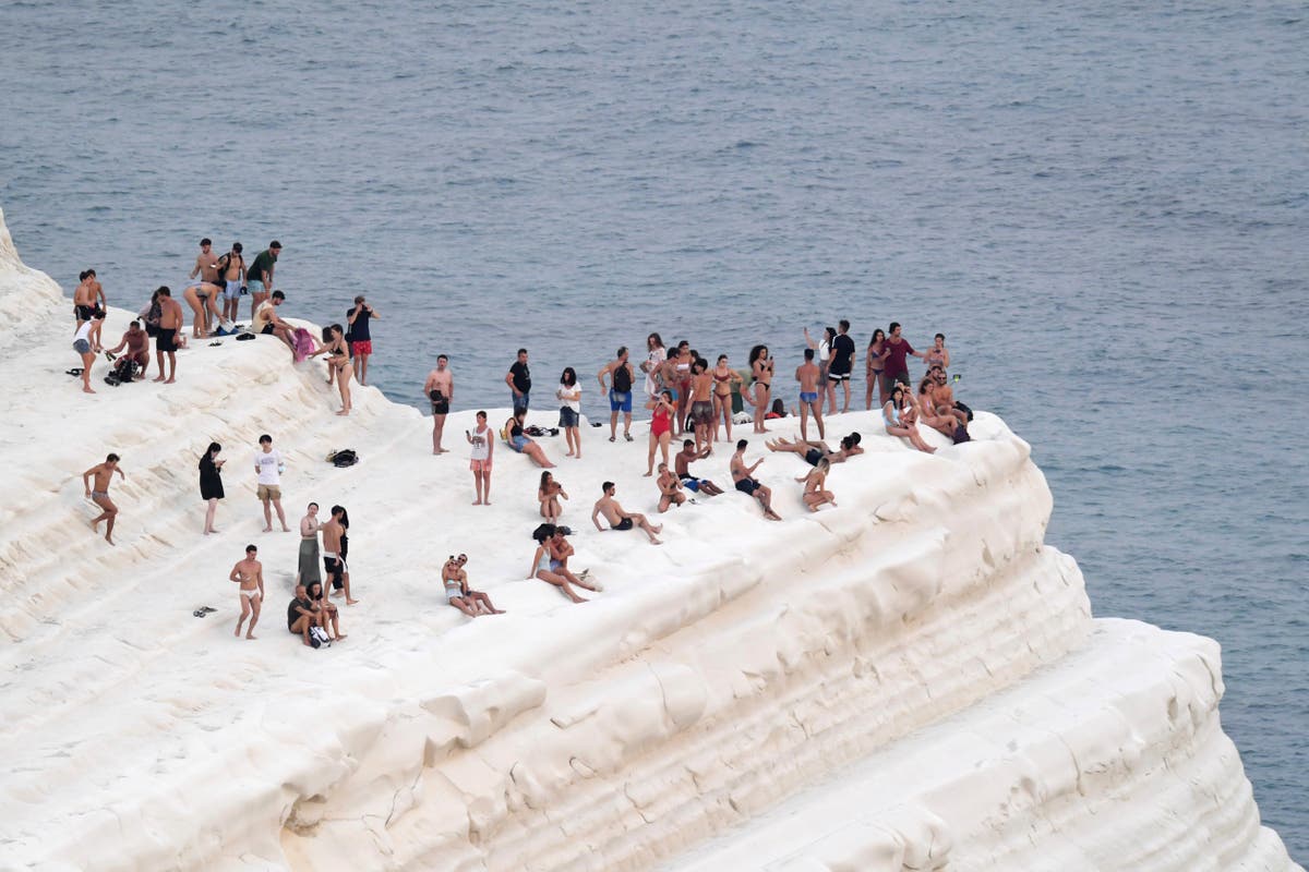 Days of hot weather grip Southern Europe, North Africa