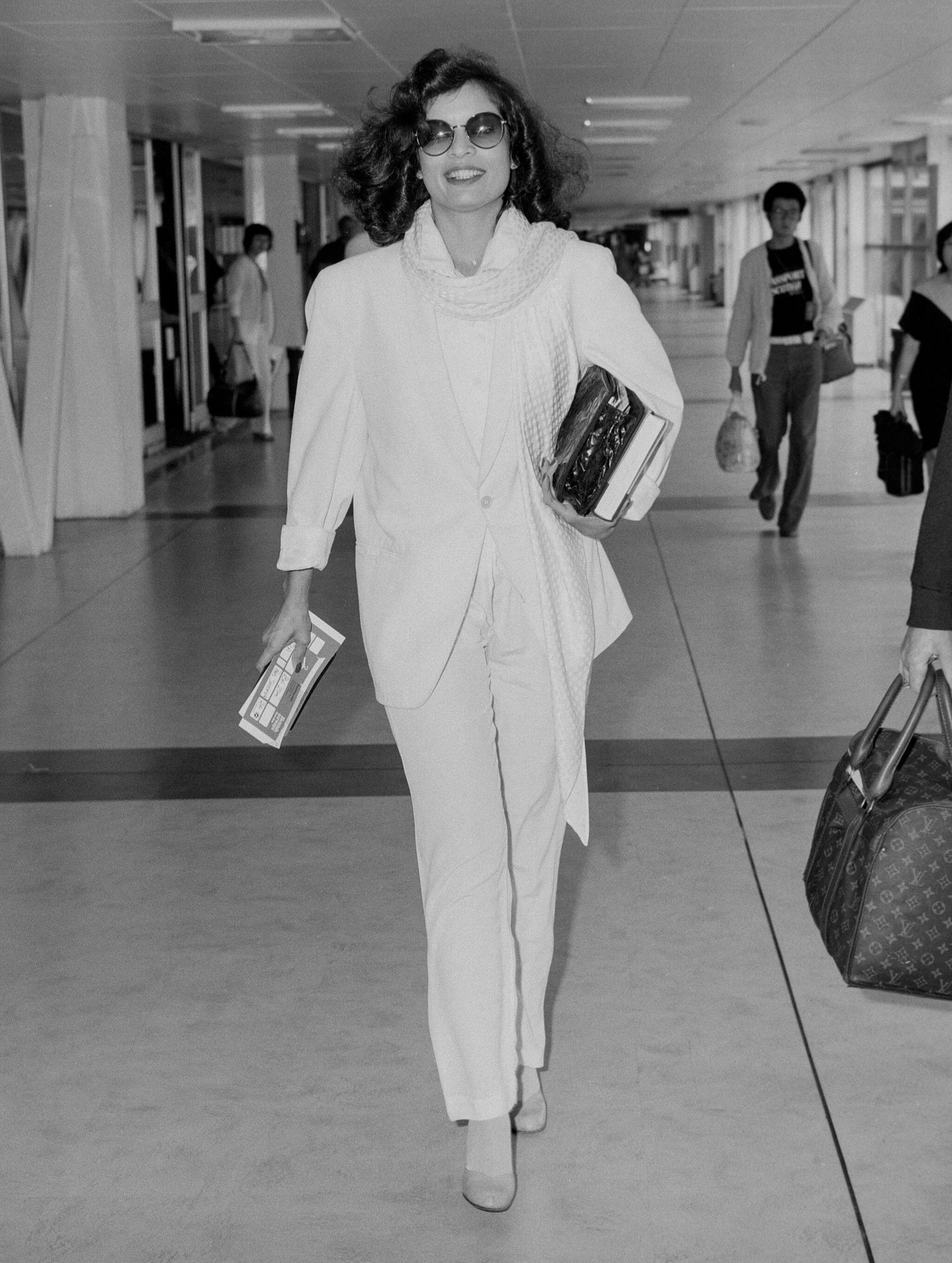 Style icons including Bianca Jagger helped make trousers more mainstream in the 1970s (Alamy/PA)
