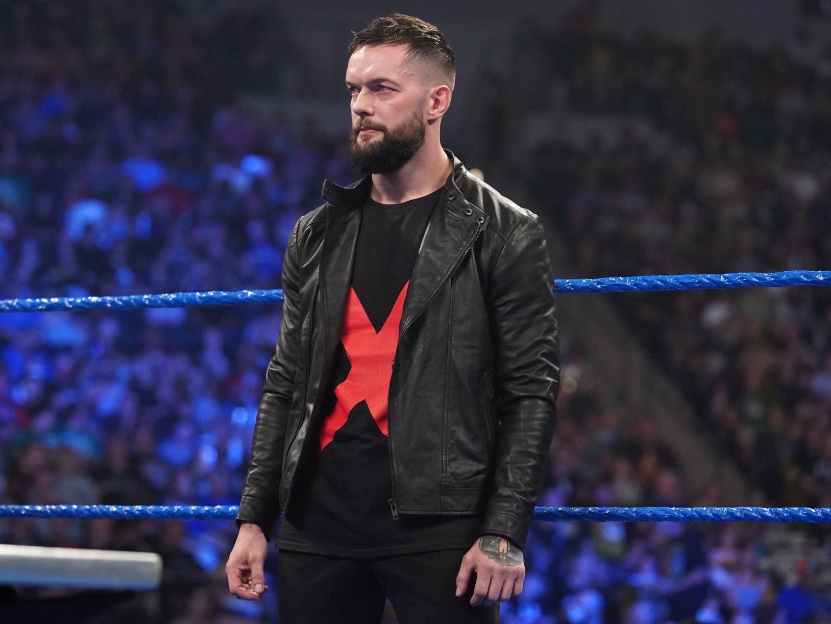 WWE star Finn Balor watches on in the ring on SmackDown