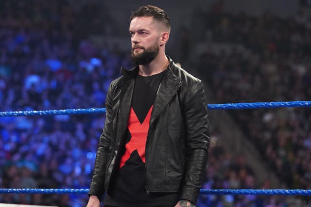 <p>WWE star Finn Balor watches on in the ring on SmackDown</p>