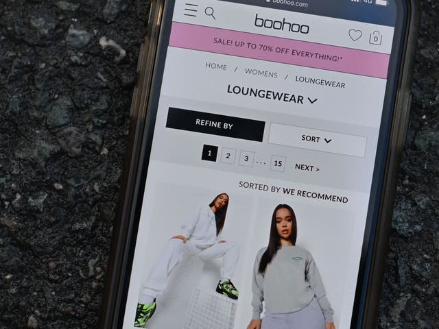 <p>Boohoo’s website on a mobile phone</p>