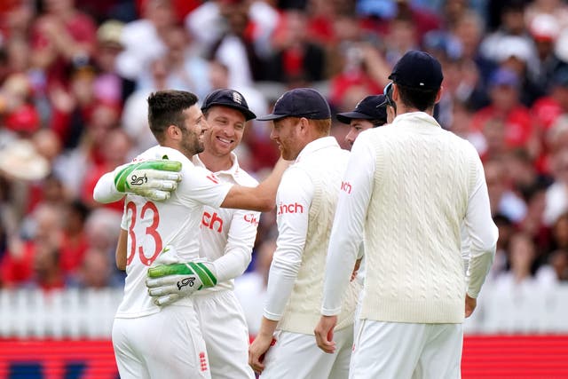 England’s Mark Wood (left) celebrates with team-mate Jos Buttler after the dismissal of India’s Rishabh Pant (Zac Goodwin/PA Images).