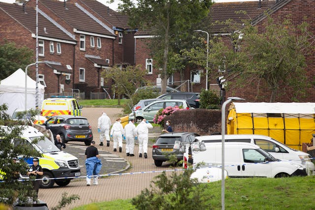 <p>Police teams work near the scene on Biddick Drive following a shooting in Keyham, Plymouth yesterday evening </p>