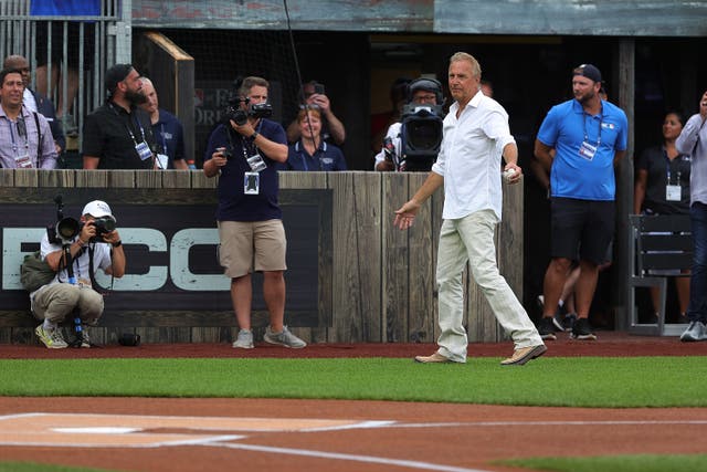 <p>Kevin Costner walks onto the field prior to a game between the Chicago White Sox and the New York Yankees</p>