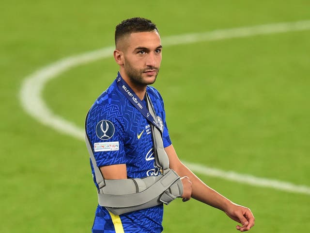 <p>Hakim Ziyech is seen with his arm in a sling during the presentation ceremony</p>