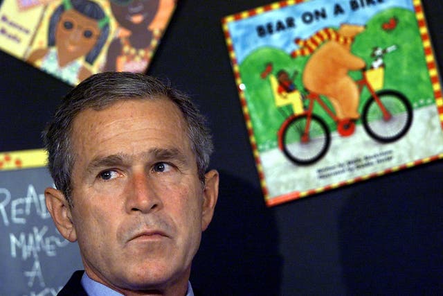 <p>Then-president George W Bush learns the United States is under attack on 11 September, 2001</p>