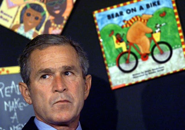 <p>Then-president George W Bush learns the United States is under attack on 11 September, 2001</p>